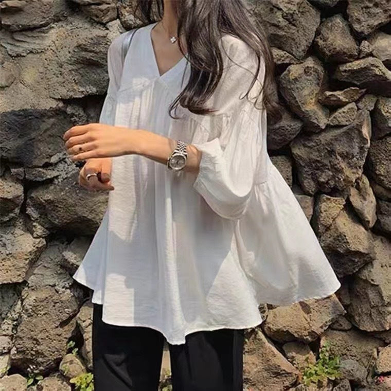 Solid-Color V-Neck Three-Quarter Sleeve Shirt.