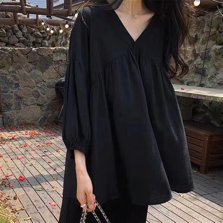 Solid-Color V-Neck Three-Quarter Sleeve Shirt.