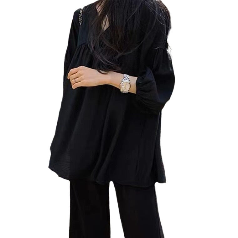 Solid-Color V-Neck Three-Quarter Sleeve Shirt.